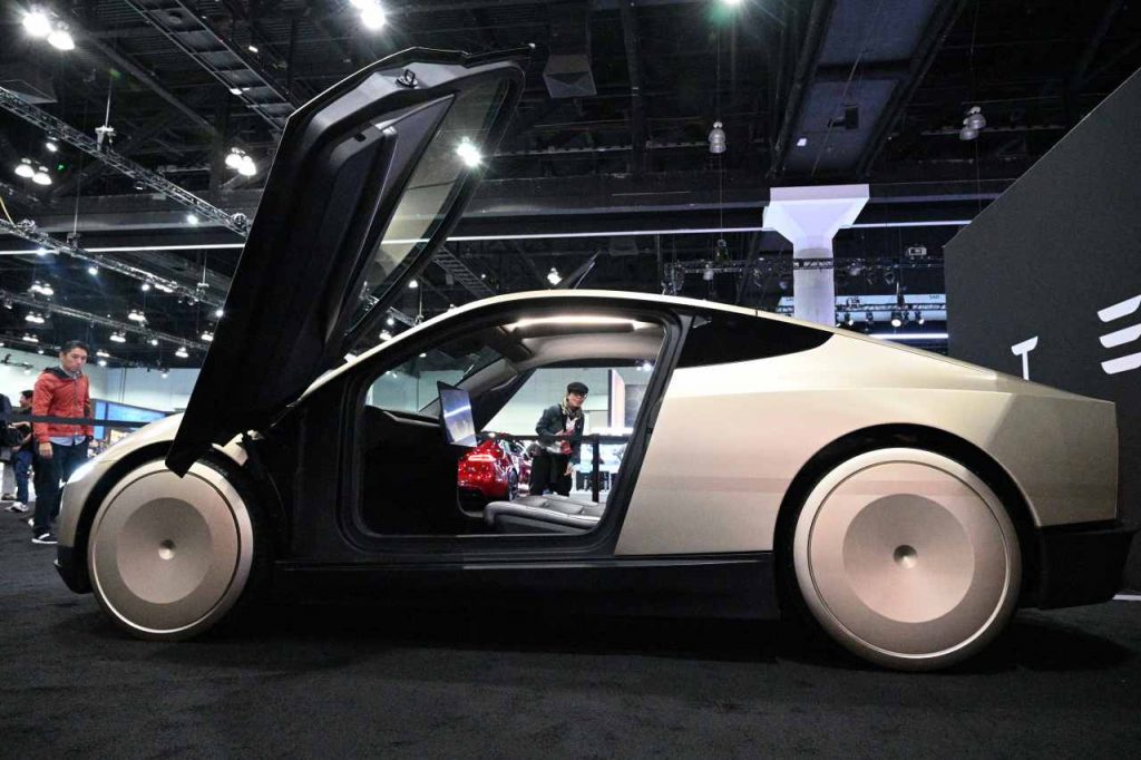 Tesla’s stock pops on a robotaxi milestone. Here’s what comes next.
