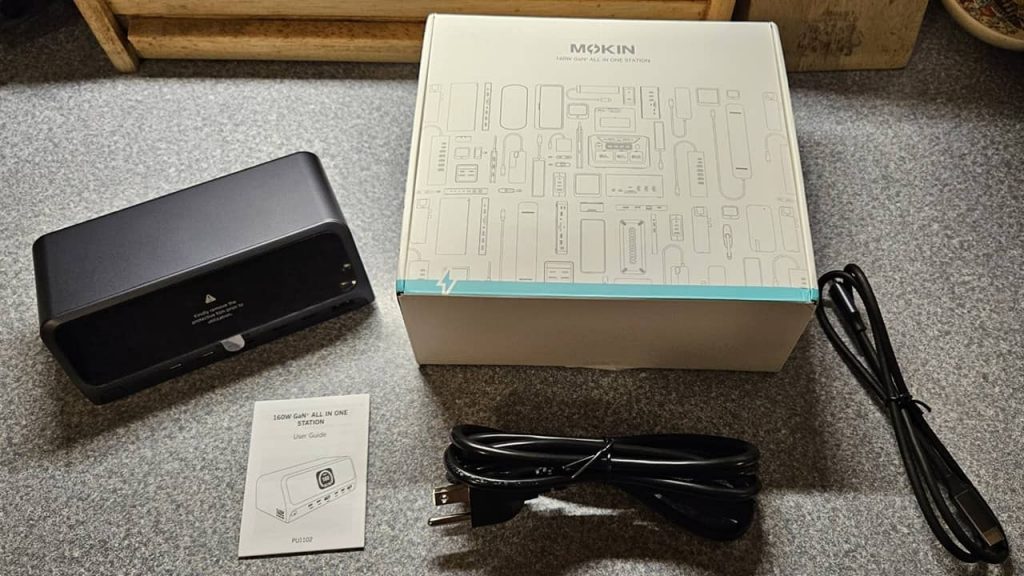 MOKiN docking station with box, cables, and manual.