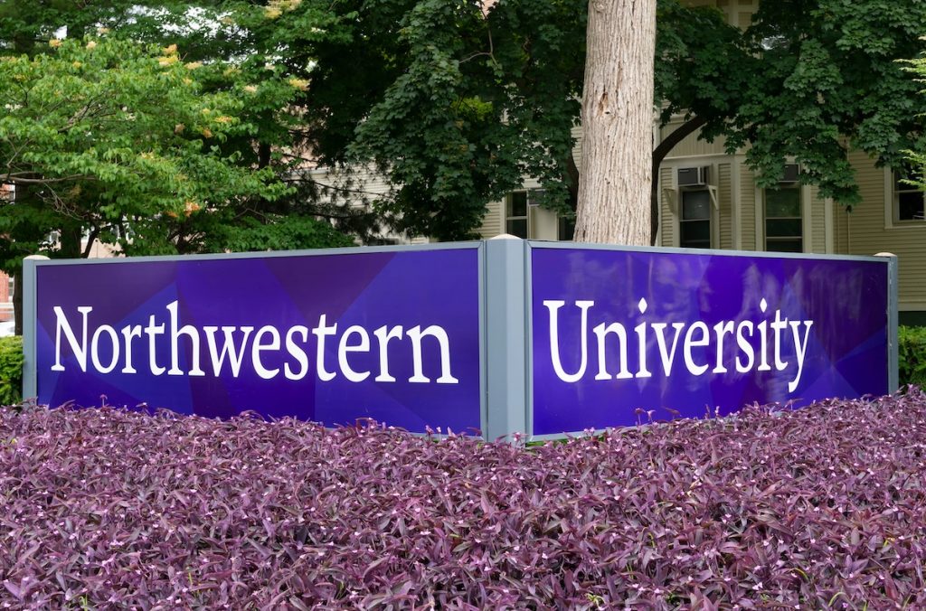 EVANSTON, IL,USA - JUNE 20, 2021 - Entrance sign and gardens to Northwestern University.