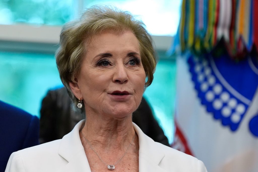 Education Secretary Linda McMahon speaks in the Oval Office of the White House before President Donald Trump signs an executive order regarding childhood cancer and the use of AI, Tuesday, Sept. 30, 2025, in Washington. (AP Photo/Alex Brandon)