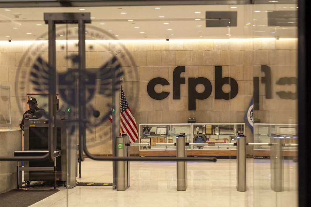CFPB Seeks Court Approval to Lay Off 50% Of Its Employees A security officer works inside of the Consumer Financial Protection Bureau (CFPB) building headquarters, Feb. 10, 2025, in Washington. (AP Photo/Jacquelyn Martin, File)