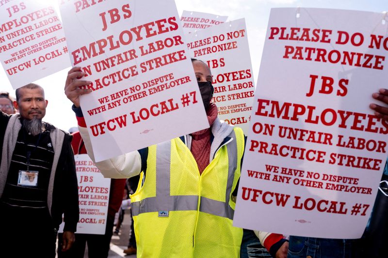 Striking JBS workers to return to Colorado plant on promise of talks