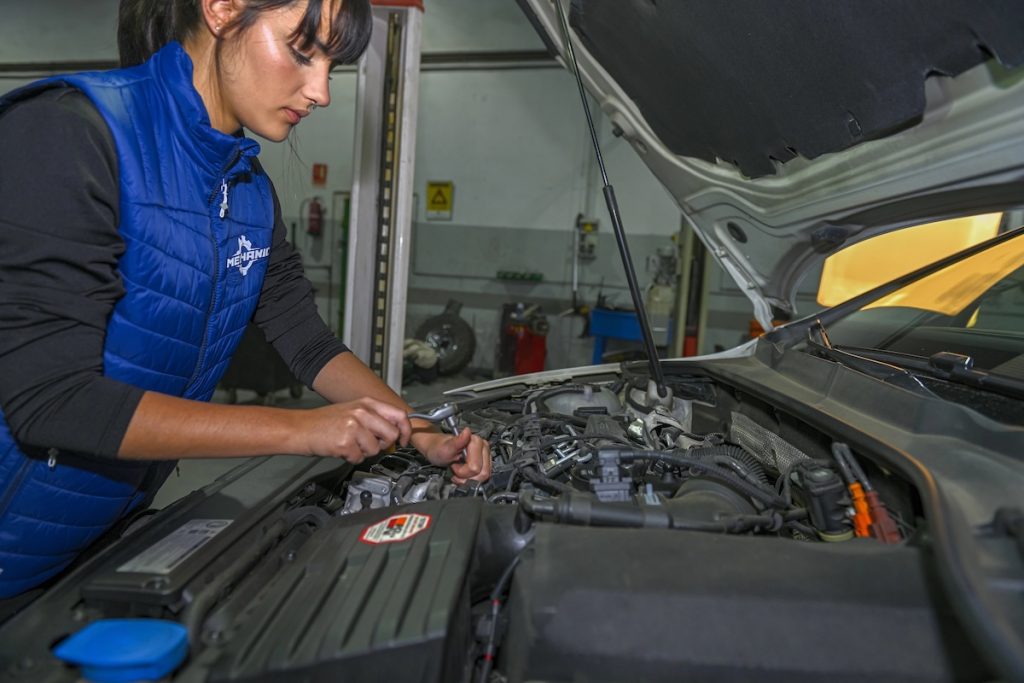 Workforce Training Young Female Mechanic