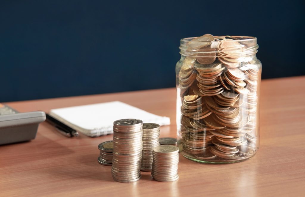 CIT Bank’s Platinum Savings Now Pays 4.10% APY For Six Months Coins stored in a jar, representing the interest earned on your savings account. Source: The College Investor