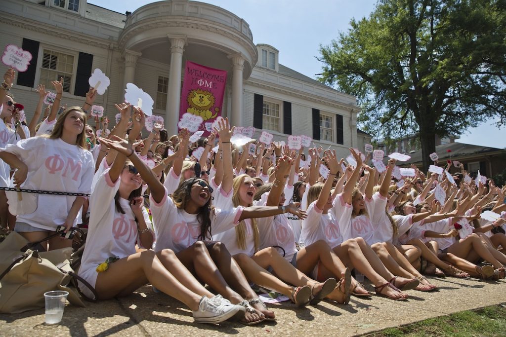 How Much Does It Cost To Rush? (Based On Real Bama Numbers) The University of Alabama Phi Mu's newest sorority members, in front, gather at sorority house for a photograph during Bid Day on Saturday, Aug. 16, 2014, in Tuscaloosa, Ala. The university became embroiled in controversy in 2013 after the student newspaper reported some white sororities had rejected blacks as new members because of race. At the end of 2014 sorority recruitment, black women made up 1 percent of new members. (AP Photo/Brynn Anderson)