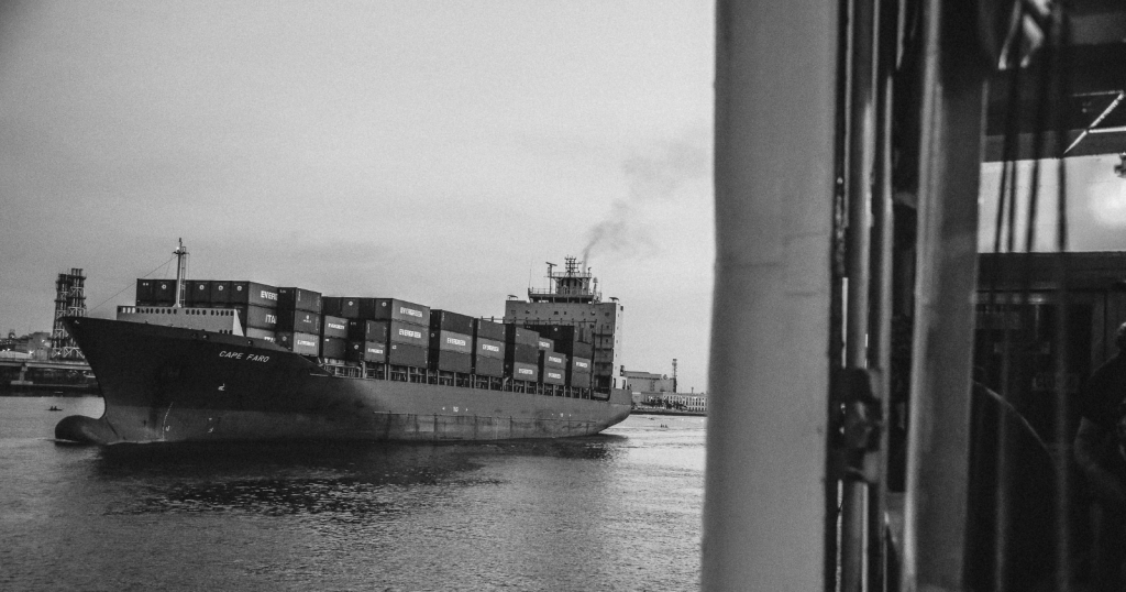 How did a 1956 shipping container standardised at 8 by 8 by 20 feet cut cargo loading costs from about $5.83 a tonne to 16 cents and quietly rebuild world trade? Featured Image