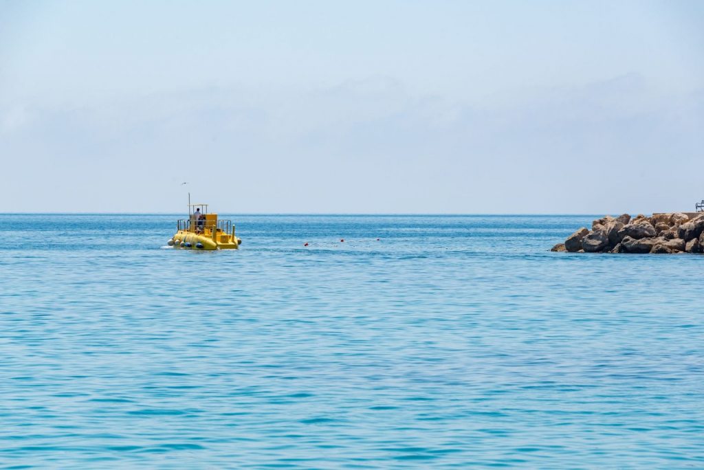How does a fibre-optic cable no thicker than a garden hose carry roughly 99 per cent of intercontinental internet traffic across 13,000 kilometres of ocean floor?